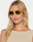 Cameron Chartreuse Sunglasses on model with average oval face shape
