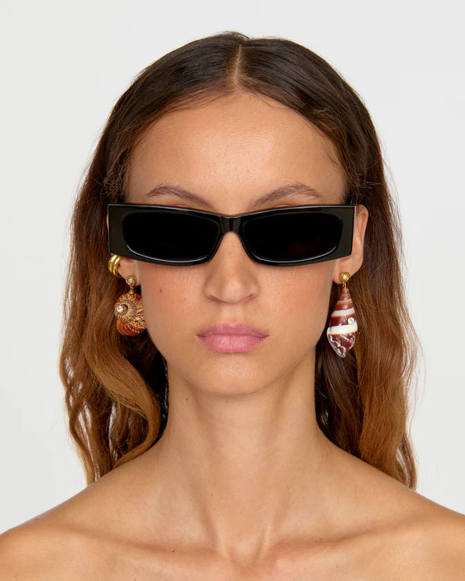 Caracol Earrings front view on model