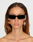 Caracol Earrings front view on model