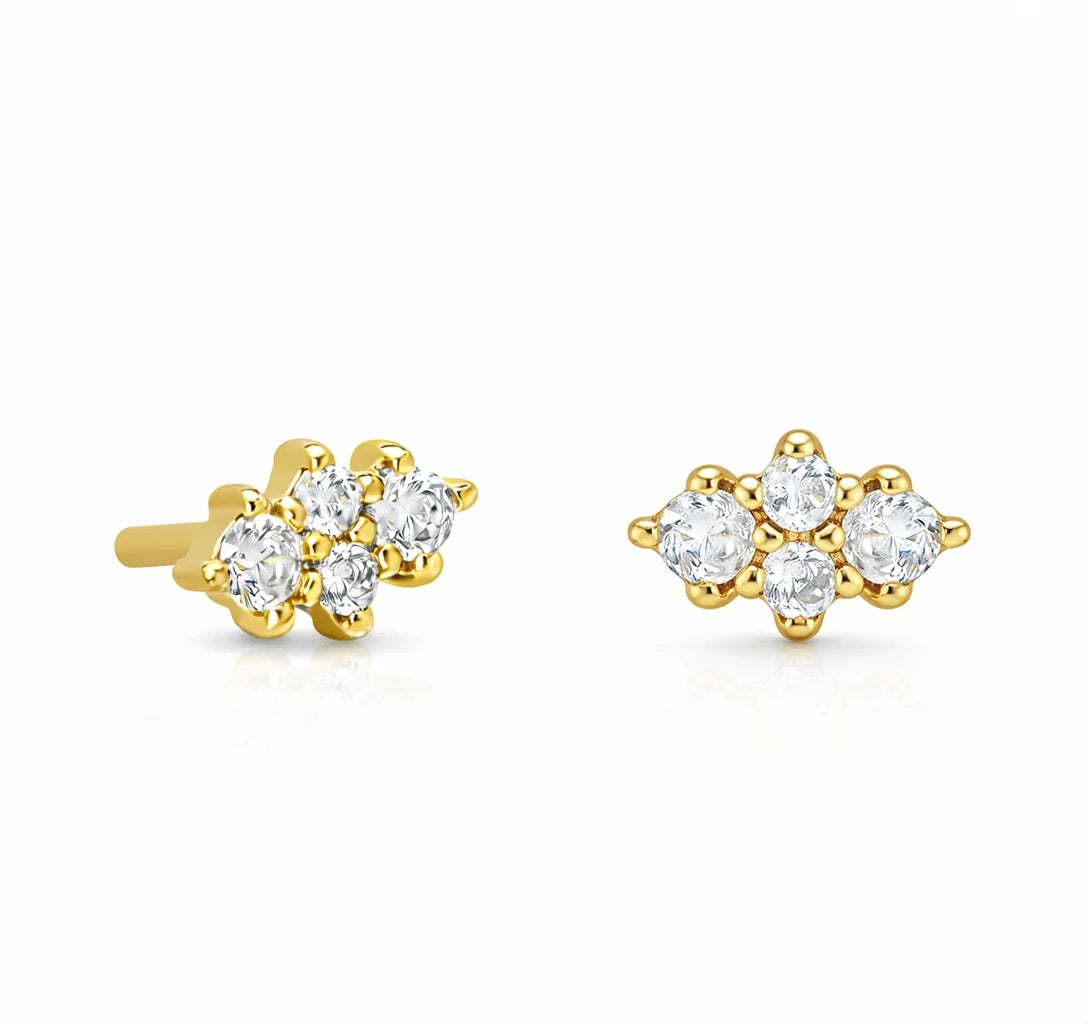 A pair of yellow gold stud earrings with small clear gemstones, shown on a clean white background.