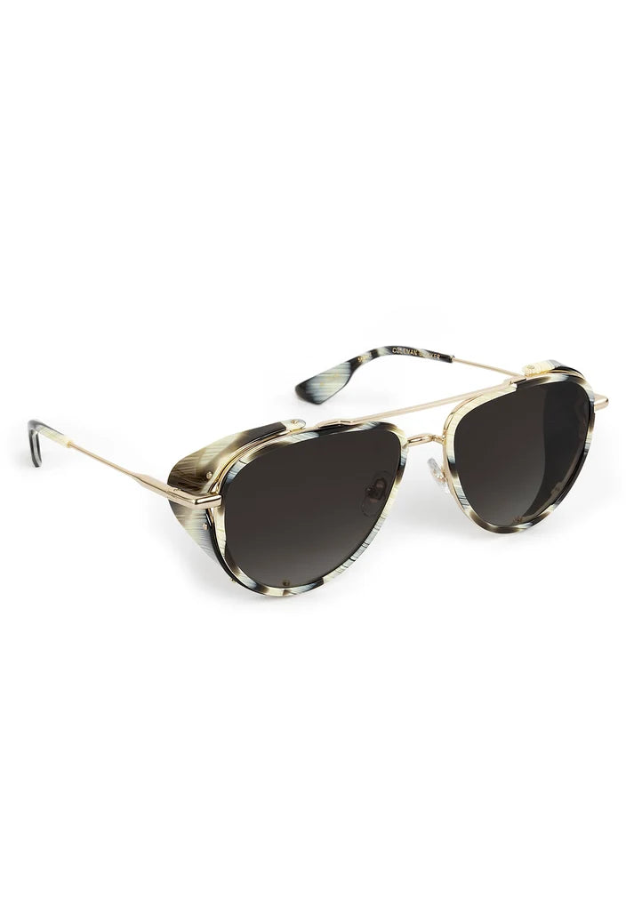 Aviator sunglasses with patterned arms on a white background