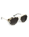Aviator sunglasses with patterned arms on a white background