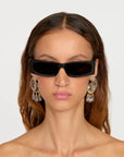Comporta Earrings front view on model