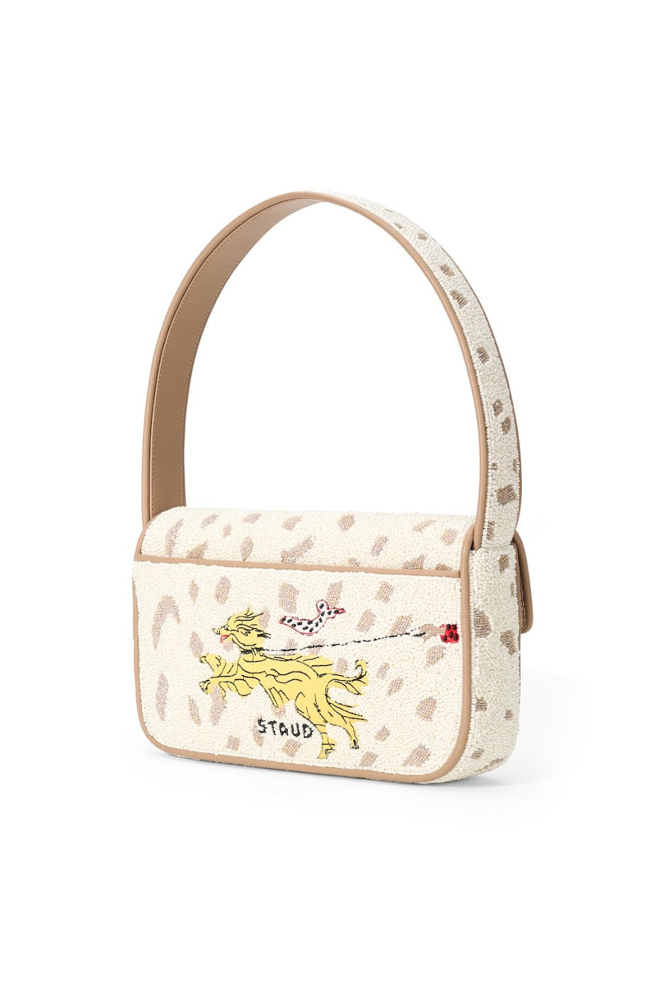 A Staud shoulder bag in beige canvas with brown leopard spots, featuring a yellow embroidered dog on a leash and the Staud logo.