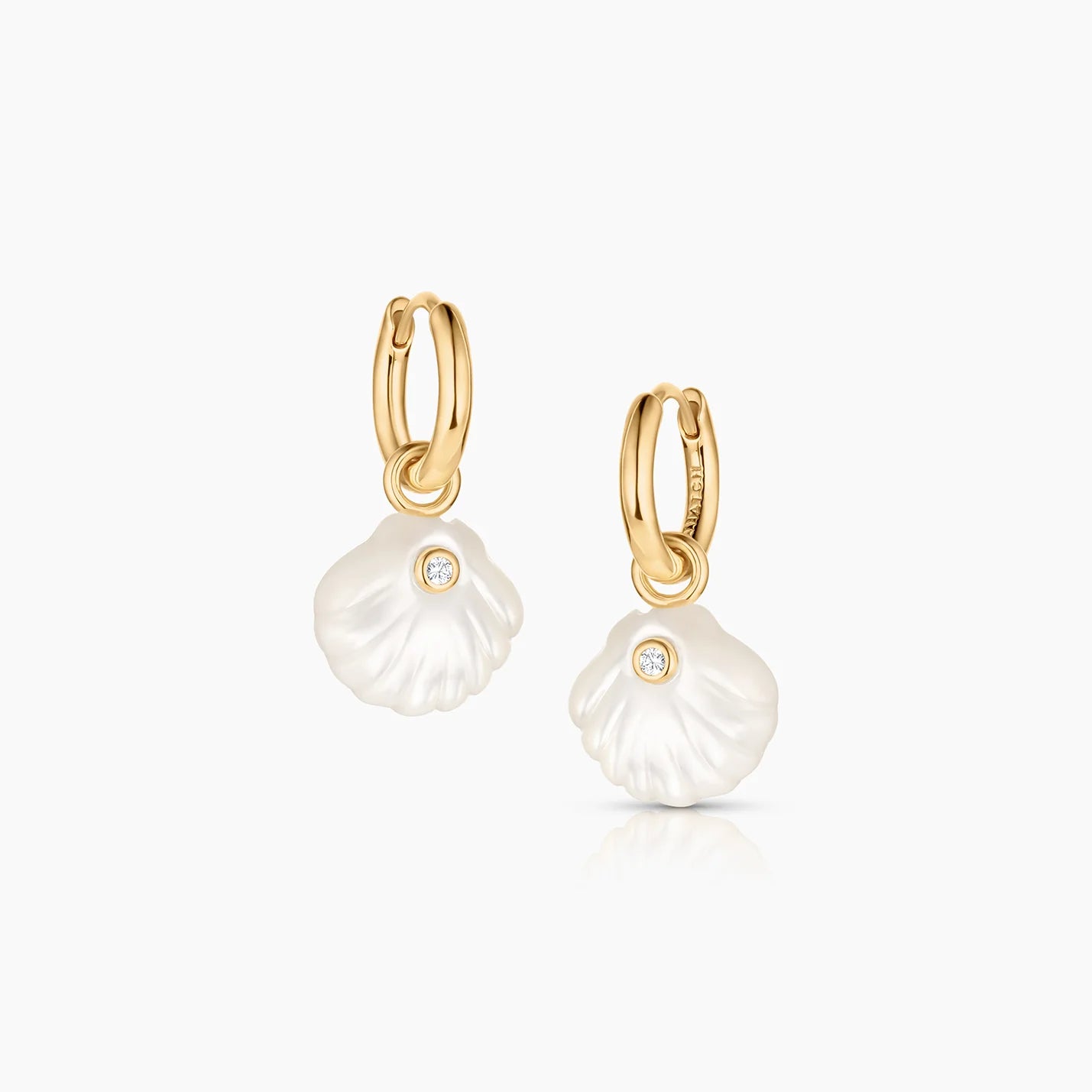 Coquille Mother Of Pearl Hoop Earrings side by side
