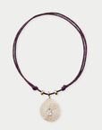 Shell necklace with a textured pendant on a white background