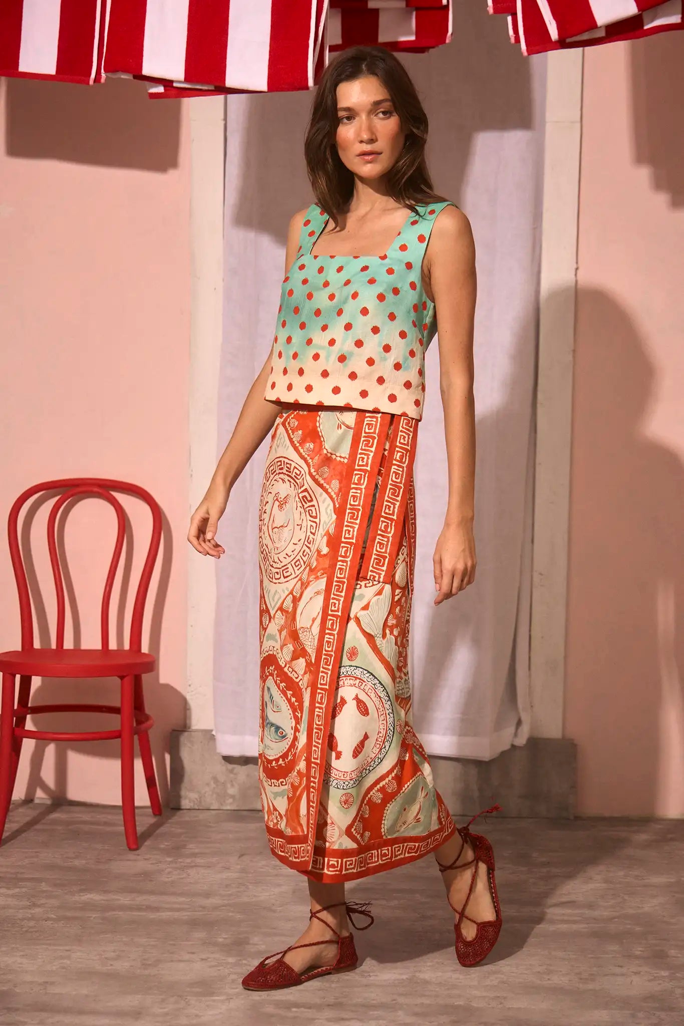 Corby Top full body front view and slight side view paired with patterned skirt