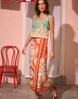 Corby Top full body front view and slight side view paired with patterned skirt