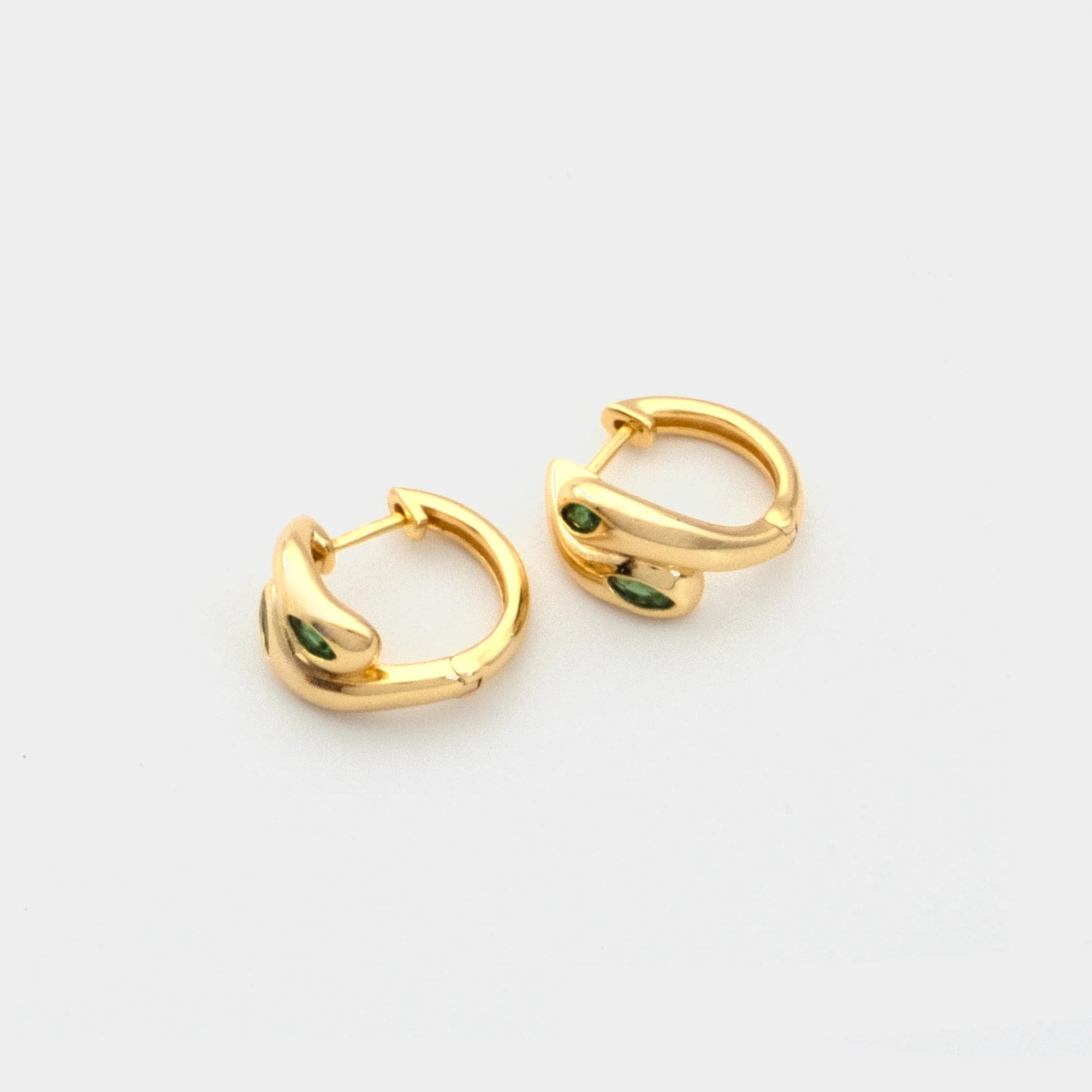 Cosimo Hoop Earrings Emerald laid down