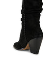 Black boot with a chunky heel on a white background