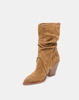Tan suede boot on a white background