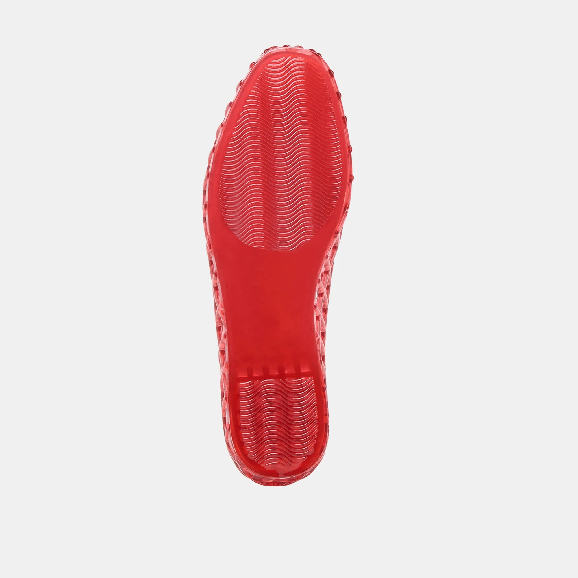 Red shoe sole on a light gray background