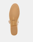 Beige sandal with 'Dolce Vita' branding on a white background