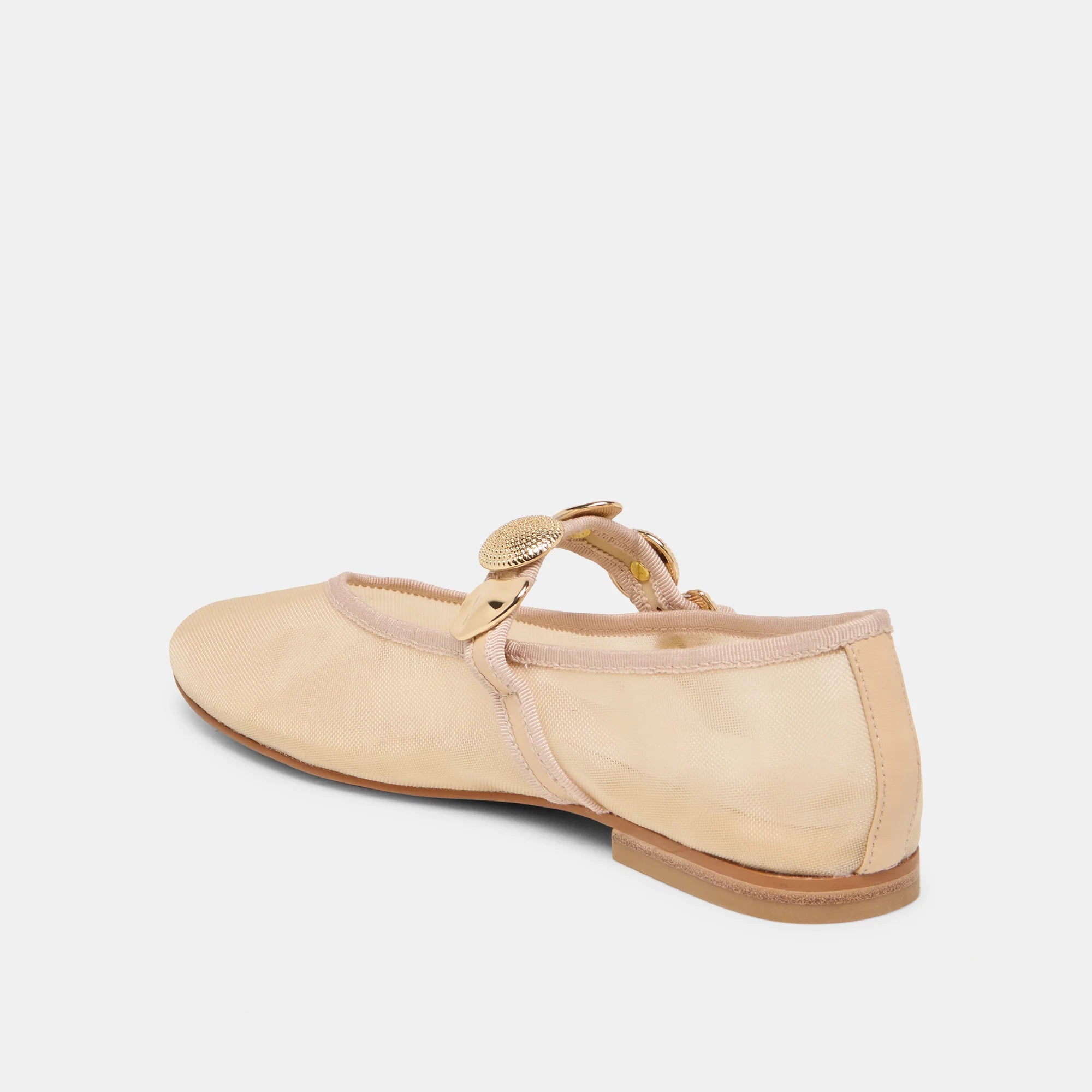 Beige ballerina shoe with a strap on a light gray background