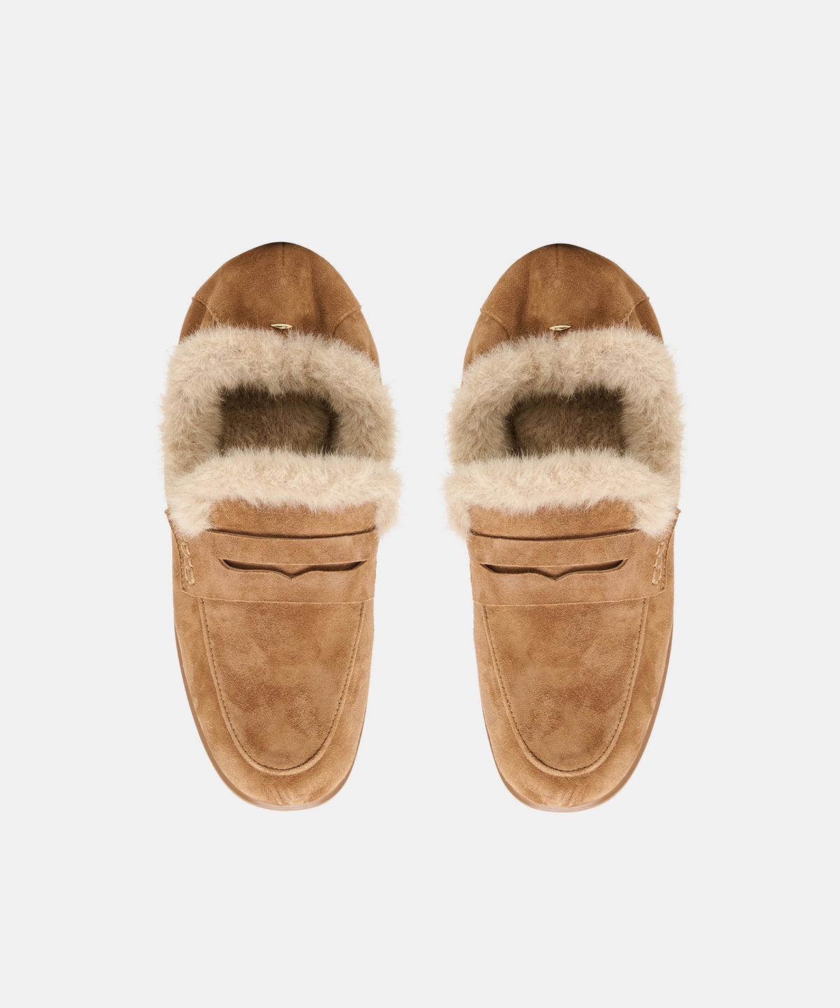 A pair of tan suede slip-on loafers with a thick cream shearling-style lining, shown from a top-down view on a light gray background.