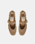A pair of taupe-brown suede Mary Jane shoes with gold-tone studs and buckle straps, shown from a top-down view on a light gray background.