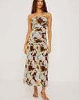 Woman wearing a floral dress on a white background