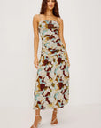 Woman wearing a floral dress on a white background