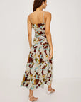 Woman wearing a floral dress on a white background