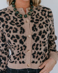 model wearing the leopard windsor cardigan with jeans 