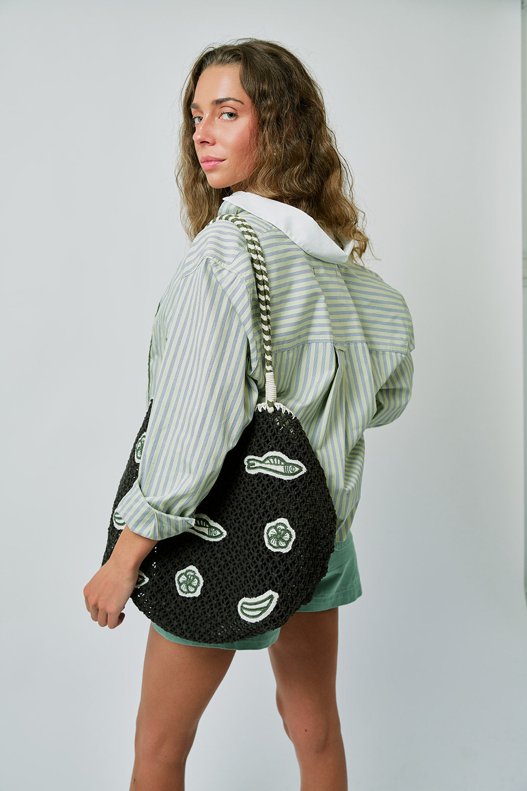 Ruth Crop in Thistle with Clare V bag, back view