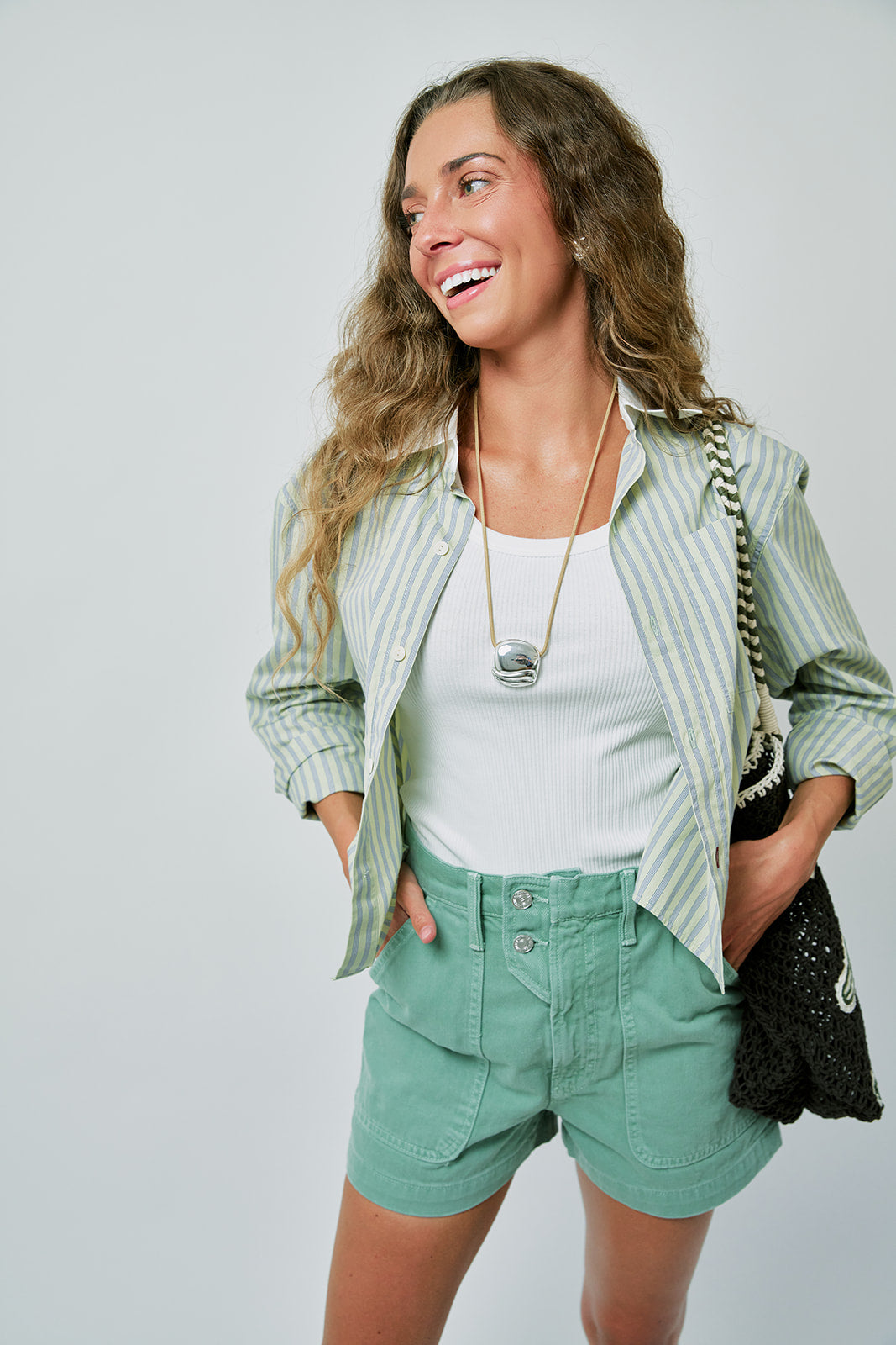 Ruth Crop in Thistle open with Agolde Shrunken Poppy Tank White and The Detour Short front view