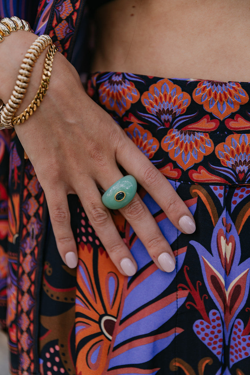 Lizzie Fortunato Monument Ring in Sage on middle finger