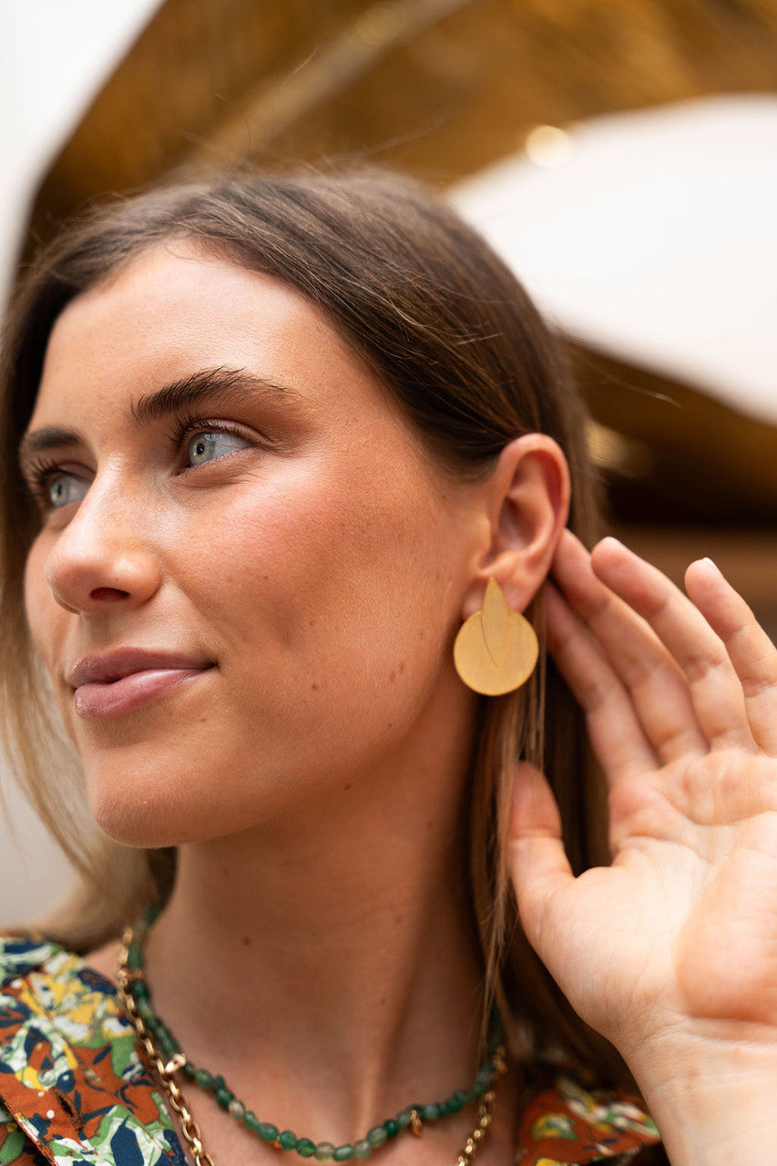 K. Bailey Gold Circle and Marquise Earrings from afar