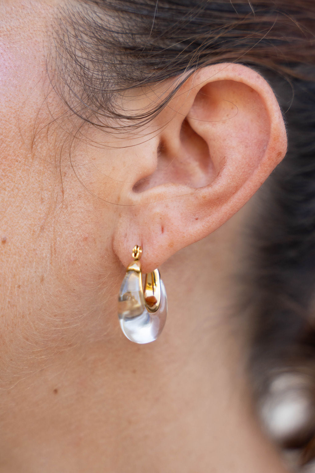 Nina Acrylic Clear Hoop on ear