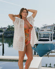 Colbee Kaftan worn open over one-piece swimsuit