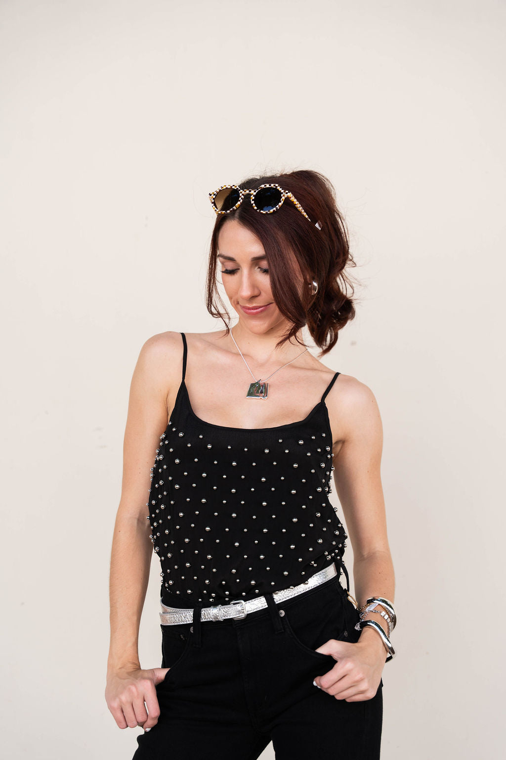 Chloe Beaded Top tucked in to jeans