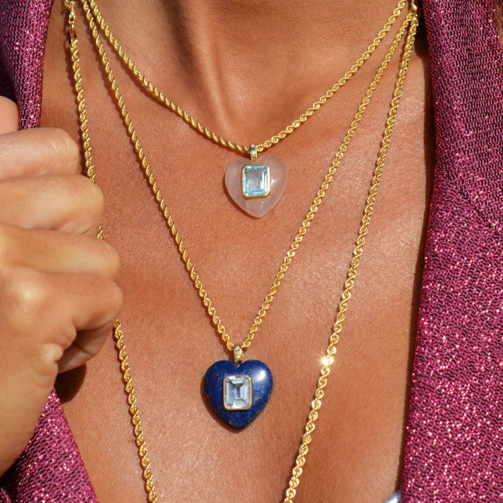 Pink Quartz Heart Pendant stacked with other necklaces