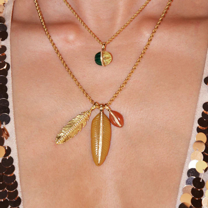 Carnelian Cowrie Pendant on necklace with other charms