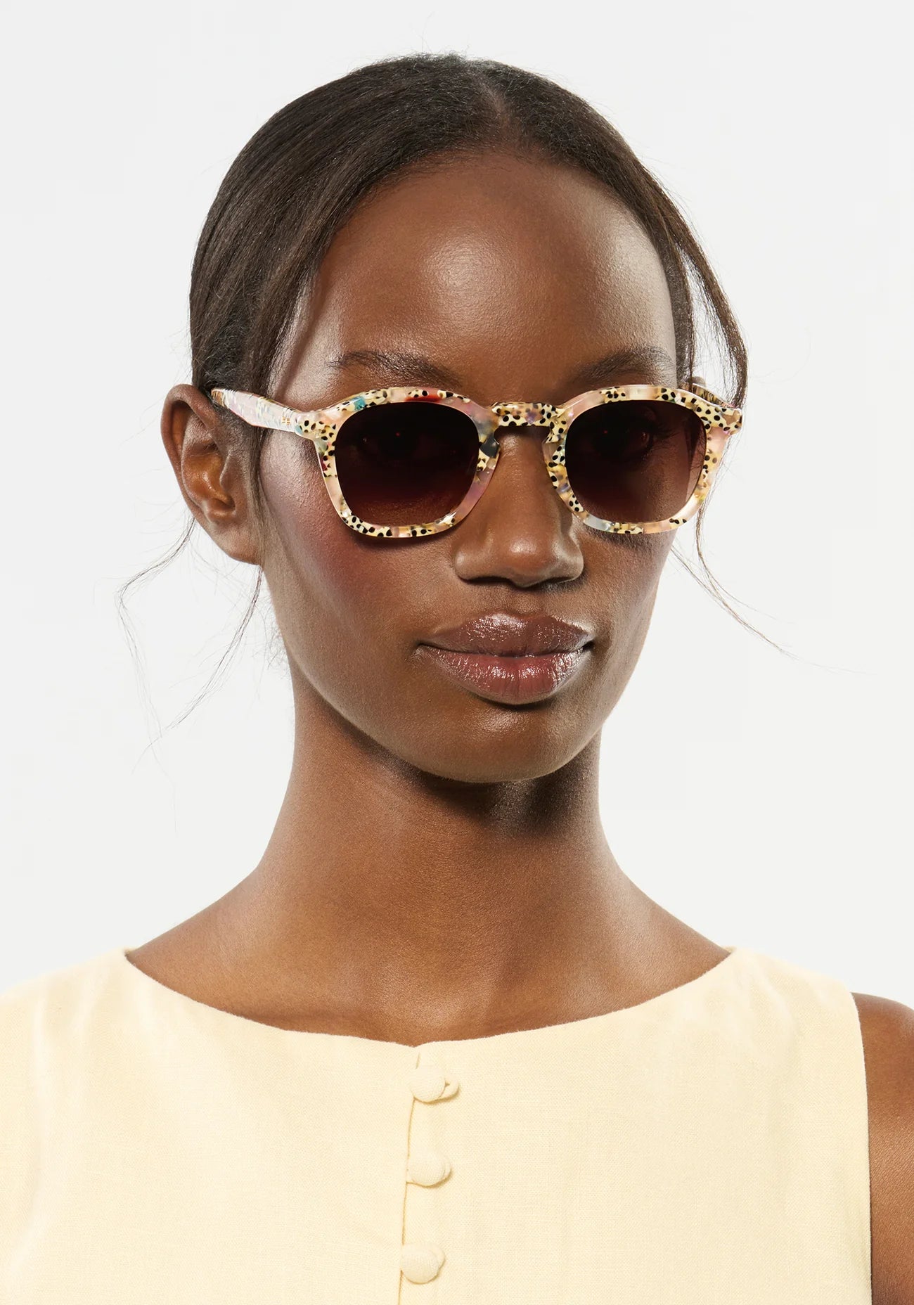 Dylan Pink Poppy Sunglasses on model with narrow, oval face shape