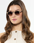 Dylan Pink Poppy Sunglasses on model with average, oval face shape