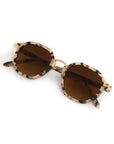 Oversized square sunglasses with tortoiseshell frames and dark brown lenses, displayed on a clean white background.