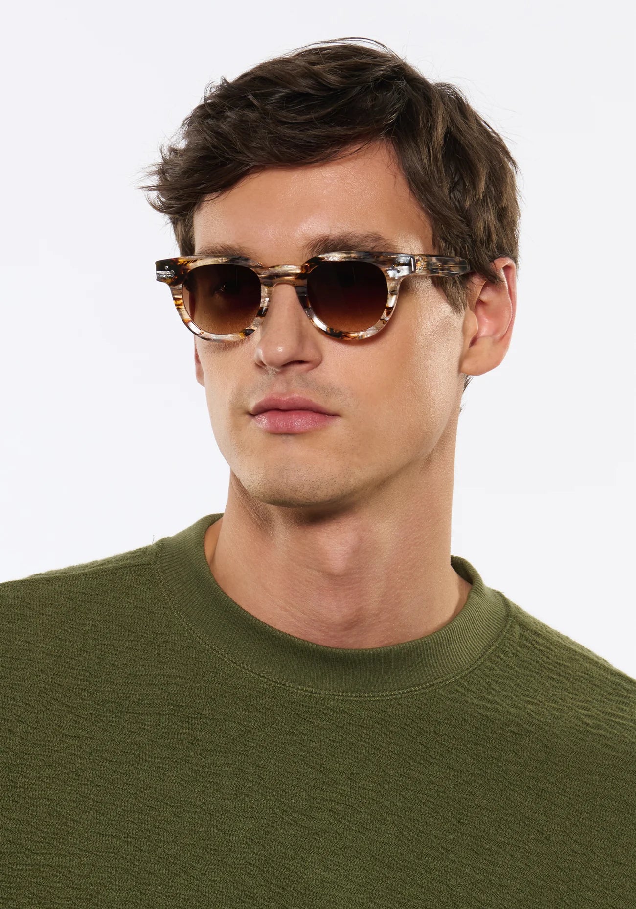 Devon Sunglasses in Plume on male model with average, heart face shape