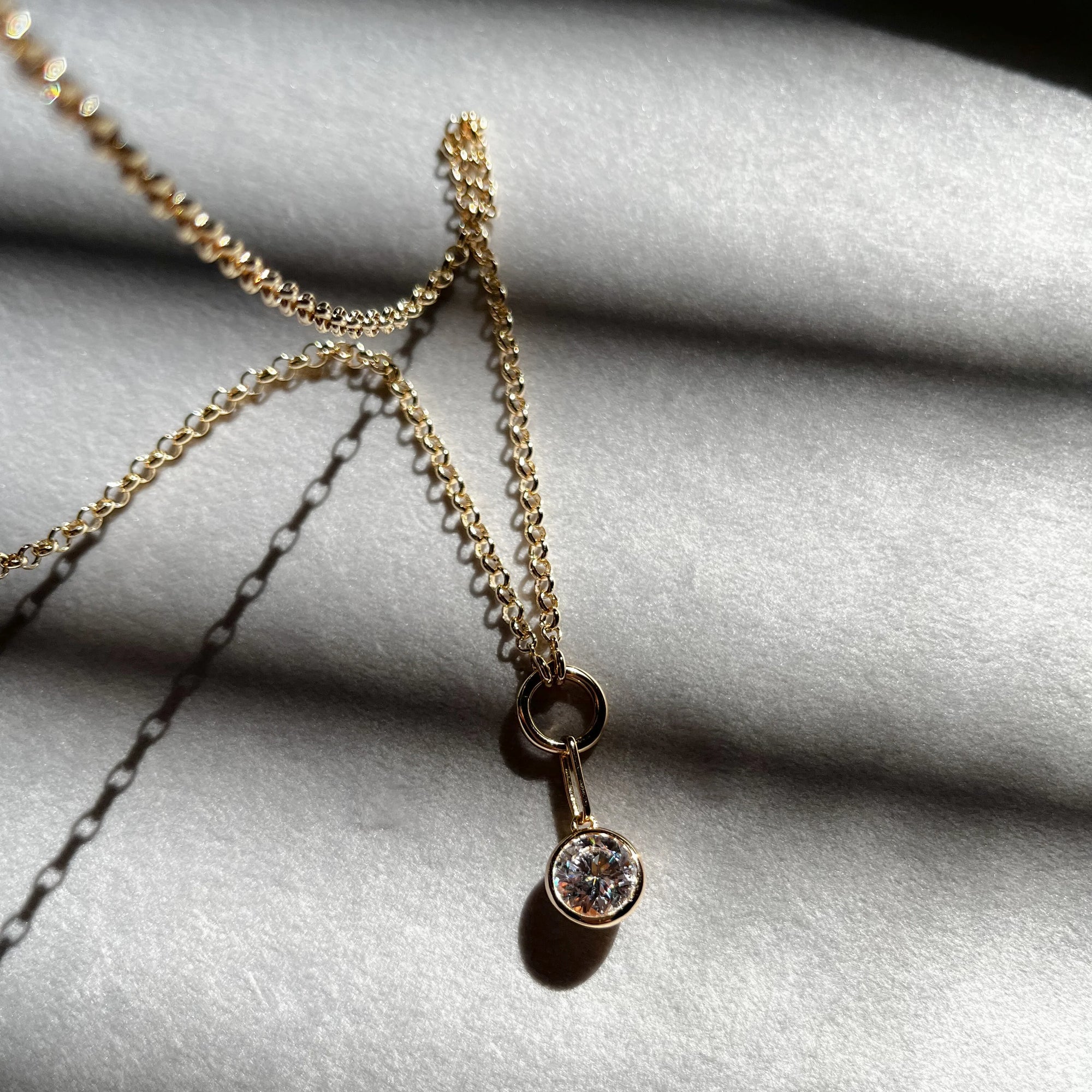 Vienna Charm Necklace with diamond charm attached