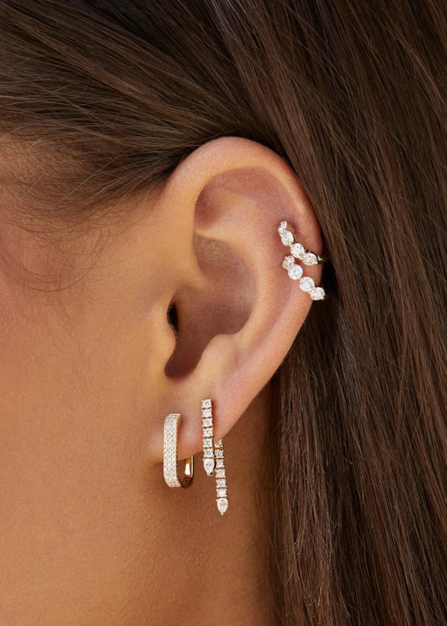 Single Diamond Teardrop Fringe Earring on ear in second hole