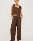 Emmie Pant Espresso full body front, hands in pockets