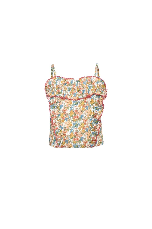 A sleeveless camisole top with a dense multicolor floral print, featuring a ruffled sweetheart neckline and thin shoulder straps, shown against a plain white background.