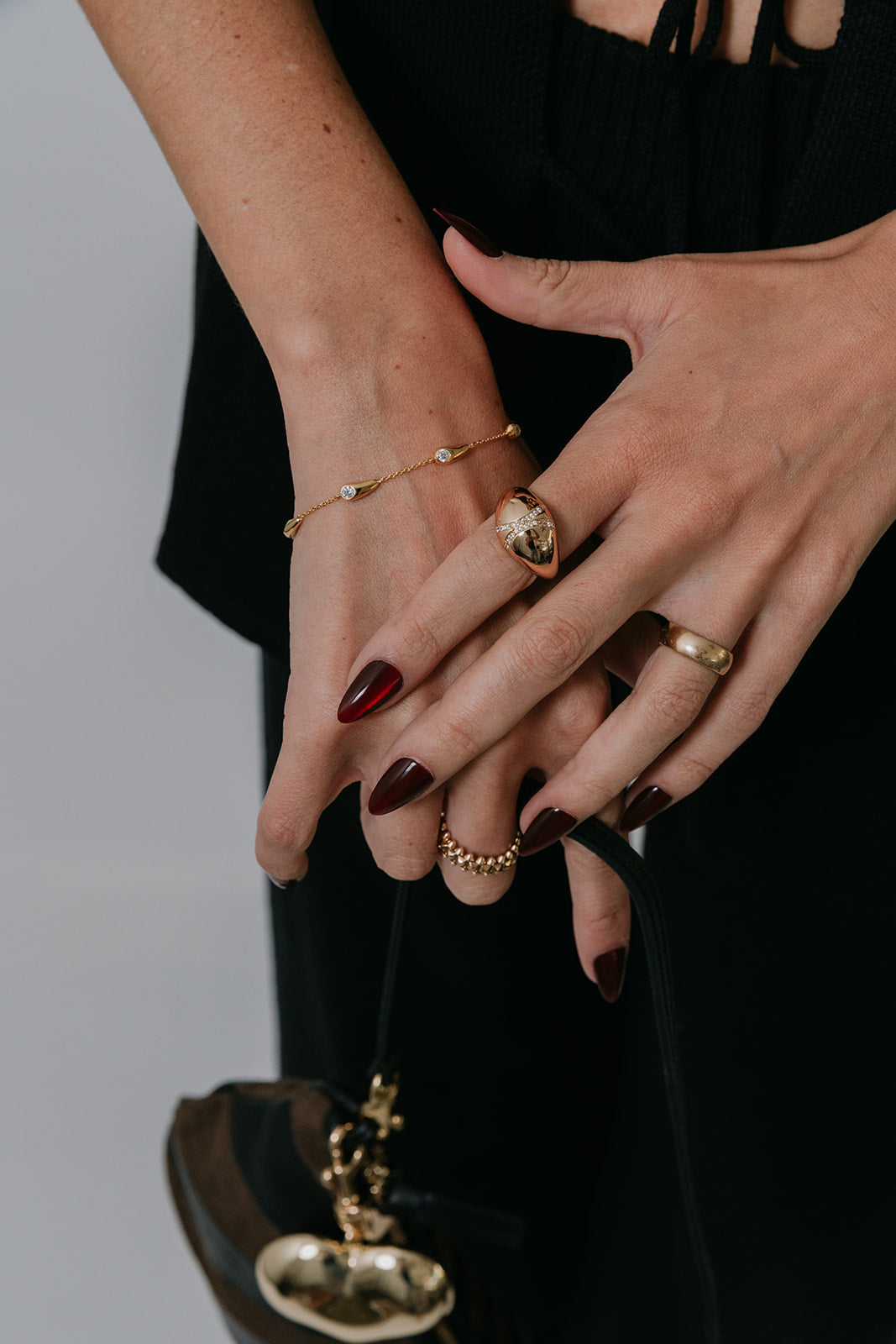 Close-up of hands with jewelry