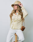 The Daily Sheer Top front with Scarab Embellished Raffia Bucket Hat