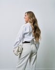 The Cropped Everything Shirt and Low Curve Utility in Bone back view