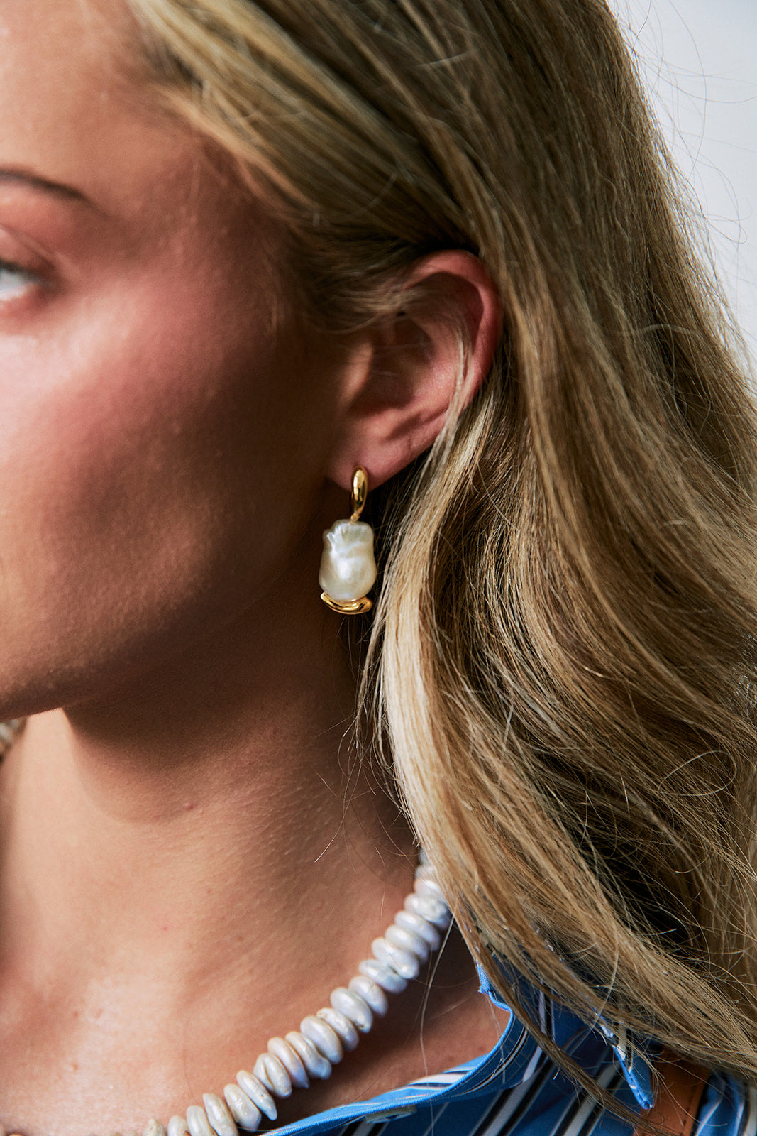 La Perla Marea Hoops on model with blue top
