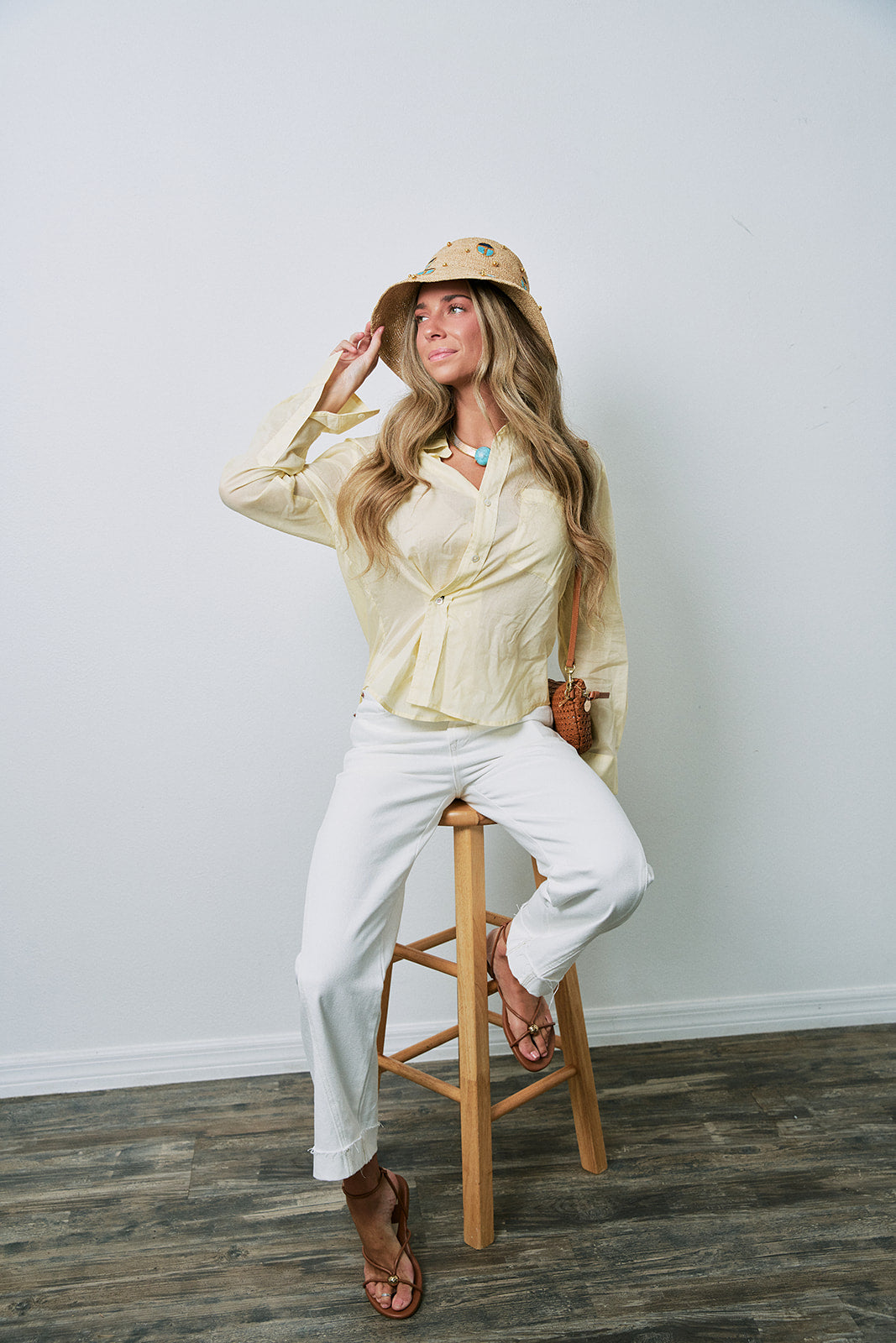 Kacey Mid Rise Cuffed Boyfriend Jean on model sitting on stool