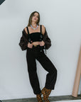 Low Curve Jean in Sloe Berry with The Great jacket with straps, full body