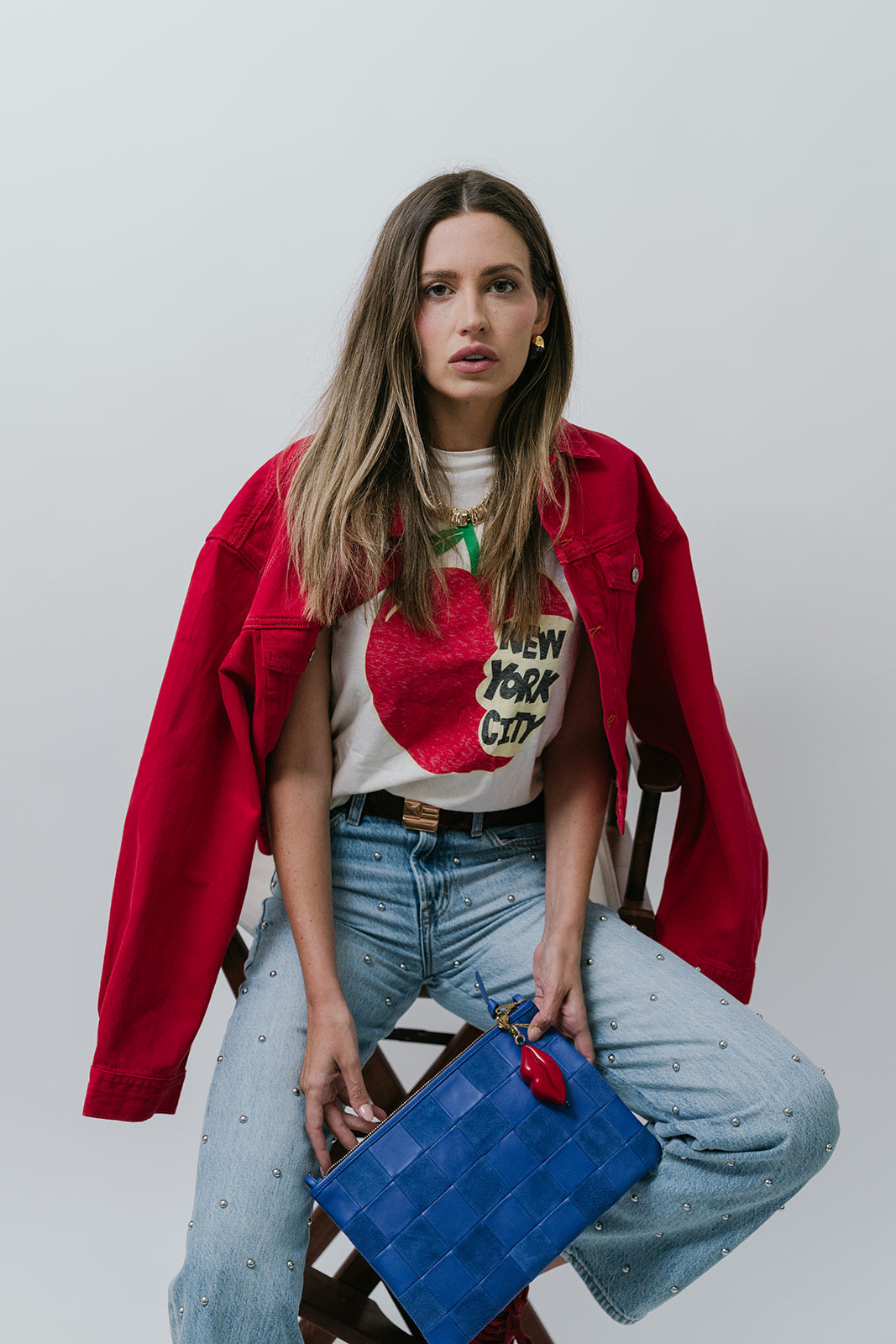 Classic Tee NYC with studded jeans and red jacket