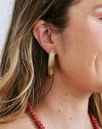 Nic Earrings Gold on ear