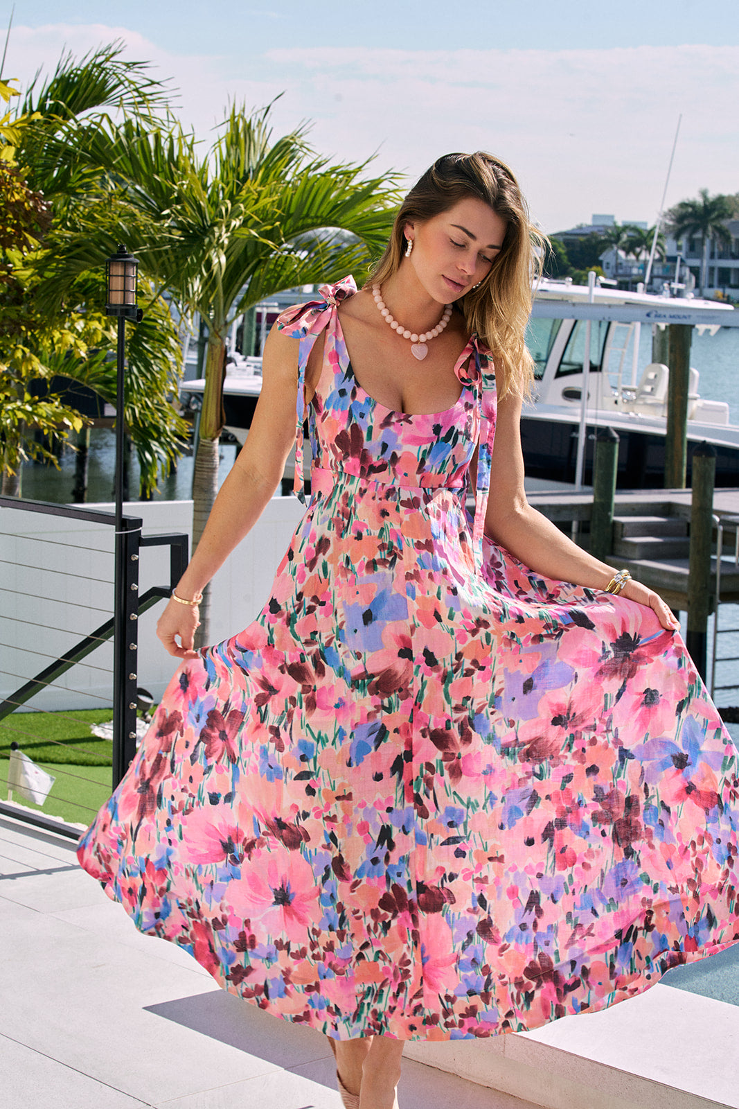 Isla Print Maxi Dress, model holding out skirt